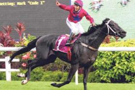 Jockey Bruno Queiroz saluting the crowd after steering the Ricardo Le Grange-trained Ace Of Diamonds to an emphatic win in the Singapore Guineas (1,600m) on May 18.
