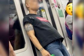 A video on social media shows a man leaning against the train doors, casually vaping.