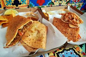 Lamb Rendang With Cheese Dosa Taco and Crispy Chicken With Podi Yoghurt Dosa Taco.