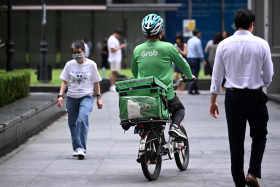 Platform workers such as delivery riders and private-hire and taxi drivers will be better protected from 2025.