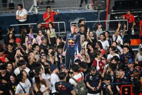 The festive atmosphere, the opportunity to mingle with like-minded fans, and the sound of the cars racing down the tarmac are just some of the reasons the Singapore Grand Prix draws hordes of Formula One fans to the tracks.
