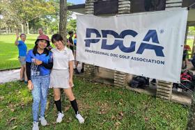 Ms Joanna Guzman (left) is one of the first females from the Philippines to play disc golf at a competitive level. 