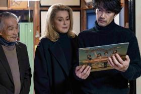 (From left) Masaaki Sakai, Catherine Deneuve and Yutaka Takenouchi in Spirit World.