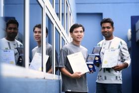 Mr Sa Thu Ya Aung (left) and Mr Jahir received the SCDF Community Lifesaver Award for their bravery.