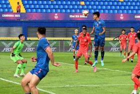 Singapore (in red) playing against Thailand at the SEA Games. The Young Lions ended their campaign with no wins from four matches.