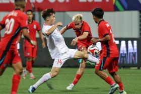 Ryhan Stewart of Singapore taking a shot during the Asean Championship semi-final, first-leg match against Vietnam at Jalan Besar Stadium on Dec 26.