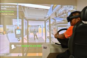 A demonstration of the bus training simulator at the SBS Transit Bus Captain Training and Certification Centre on Sept 24.