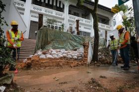 On Dec 29, a brick retaining wall at the front of two conserved terraced houses in Cairnhill Road collapsed amid the wet weather.