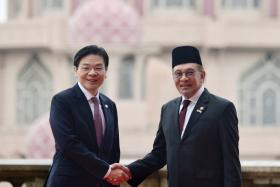 PM Lawrence Wong with Malaysian PM Anwar Ibrahim at Perdana Putra during the Leaders' Retreat on Jan 7.