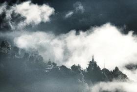 I took this photo from the Como Punakha, Bhutan, in 2021. As the world continued to battle Covid-19, I found myself spending the last day of 2021 and the first day of 2022 here in quiet contemplation. This is the view of Khamsum Valley Namgyal Chorten. This sanctuary in the clouds stands as a beacon of peace. It overlooks the breathtaking Punakha Valley in Bhutan.