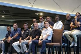 (Front row, from left) 1994 M-League and Malaysia Cup double-winning team&#039;s Zakaria Awang, David Lee, Ishamudin Bharoocha, Abbas Saad, Jang Jung, (back row, from left) Malek Awab, Nazri Nasir, Rezal Hassan, T. Ramoo, Saswadimata Dasuki, and Rafi Ali watching a highlight reel of the 1994 campaign during the 30th anniversary event at at Singapore Sports Hub&#039;s OCBC Lounge on Dec 17.