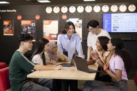 Students at Nanyang Polytechnic's School of Information Technology, which is offering an exemption from a foundational learning unit for some first-year students.