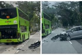 A video of the aftermath of the Sept 18 accident shows a bus with a dented rear and a car with a mangled bumper.