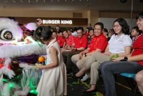 DPM Heng Swee Keat (centre) with East Coast GRC MPs (from right) Jessica Tan, Cheryl Chan, Maliki Osman and Tan Kiat How at the Chinese New Year carnival at Heartbeat@Bedok on Jan 25 