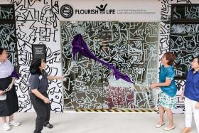 (From left) The Purple Parade chairwoman Rachel Ong, Temasek Foundation head of community networks &amp; partnerships Woon Saet Nyoon, ARC(S) president Denise Phua and ARC(S) executive director Jacelyn Lim officiating the launch of the Flourish for Life Centre on Sept 6.