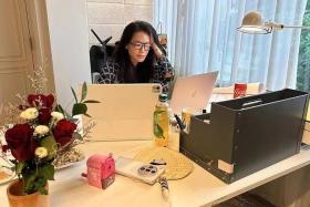 Shu Qi posted a photo of herself using the laptop on social media on July 24.