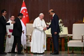 Pope Francis and President Tharman Shanmugaratnam at the welcome ceremony held at Parliament House, on Sept 12, 2024. 