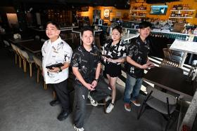 (From left) Tipsy Collective staff - supervisor Imran Bin Mohamed Jais​, assistant man​ager​ ​Jason ​Lim​, events ​manager Kelwen Liew​ and supervisor ​Derrick ​Leong ​- pictured at the Tipsy Penguin gastropub at NTUC Income@Tampines Junction on Jan 2.