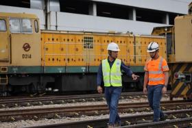 LTA's deputy director for trackwork Zailani Mohamed Idris (left) and SMRT senior engineer Shazni Jaffar were among the more than 800 workers mobilised to carry out repairs.