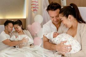 Kiss92 deejay Charmaine Yee and her husband Camilo Paredes with their first child, Mila Paredes, born last Tuesday.